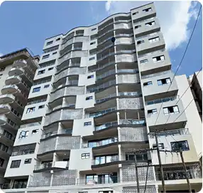 High-rise apartment building with balconies – Bomba Plumbers construction plumbing project.