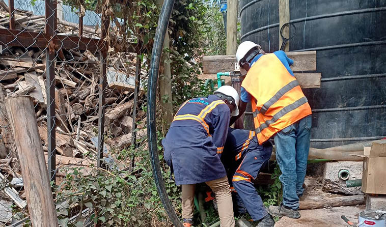Water tank connection being done by Bomba Plumbers Technicians